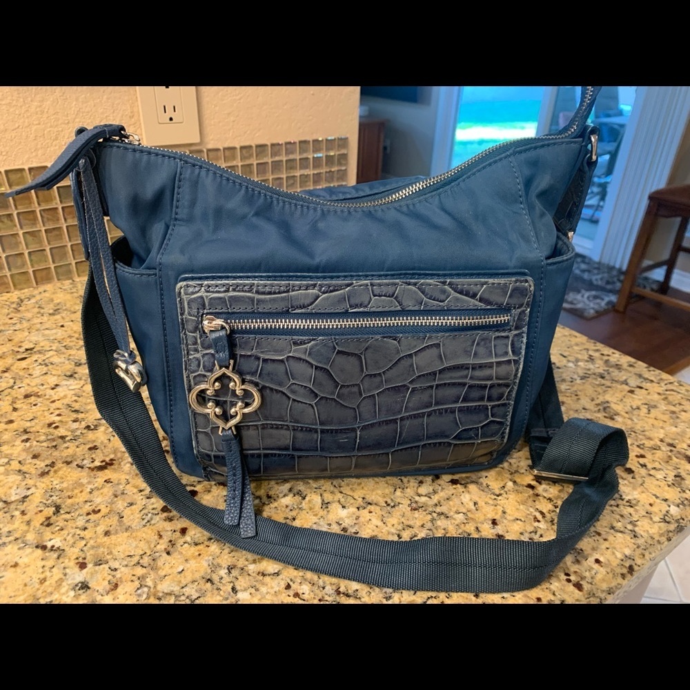 Brighton blue leather and microfiber organizer travel bag.